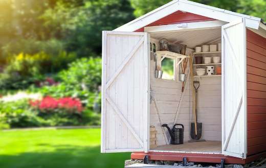 Storage shed with gardening tools